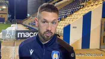 Luke Chambers: Colchester United defender vows to carry on after reaching league appearances top 10