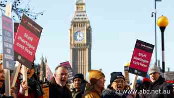 Britain's NHS workers walk off job in largest strike in organisation's 75-year history