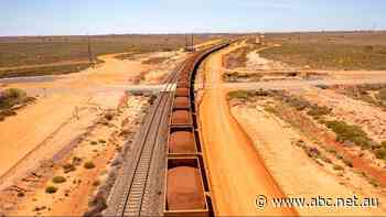 BHP worker dies after being struck by train in WA rail yard