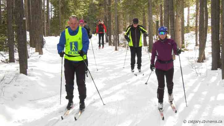 'Almost a spiritual connection': Dozens gather in Kananaskis for blind and visually impaired ski event