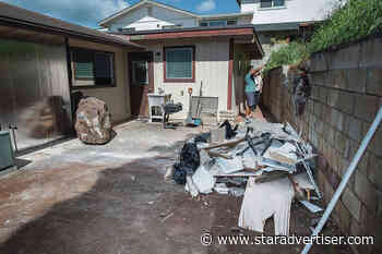 Boulder stuns Aiea homeowners