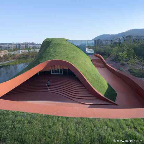 Undulating concrete landscape conceals Chinese cultural centre by Change Architects