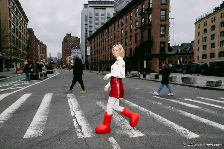 Art Collective’s ‘Big Red Boots’ Flood Social Media Feeds