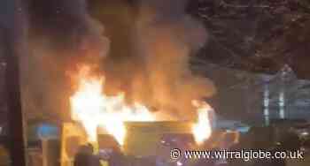 Police van torched during disturbance near hotel in Knowsley