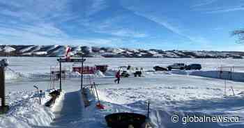Saskatchewan father-son duo goes viral after building hockey rink on Diefenbaker Lake