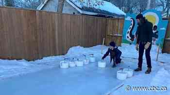 Sask. business builds backyard curling rink to help 'embrace winter a bit more'
