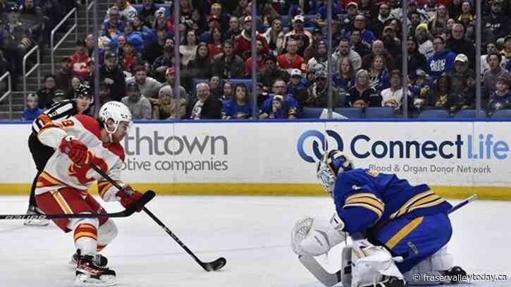 Flames get hot in second for 7-2 win over Sabres