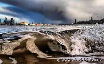 Photographer risks a soaking trying to capture the perfect wave shot