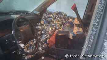 Ontario driver allegedly caught with mountain of beer cans in car