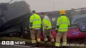 A15 Caenby Corner: Road closed after car transporter overturns