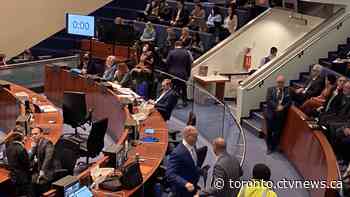 Toronto city council chambers cleared twice during budget meeting as protesters chant at Tory