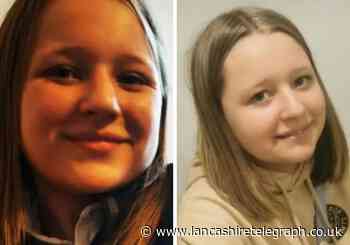 Family of Alyssa Morris holding balloon release at Clitheroe Castle