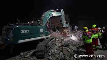 Woman asks 'what day is it?' when pulled from the rubble 228 hours after earthquake