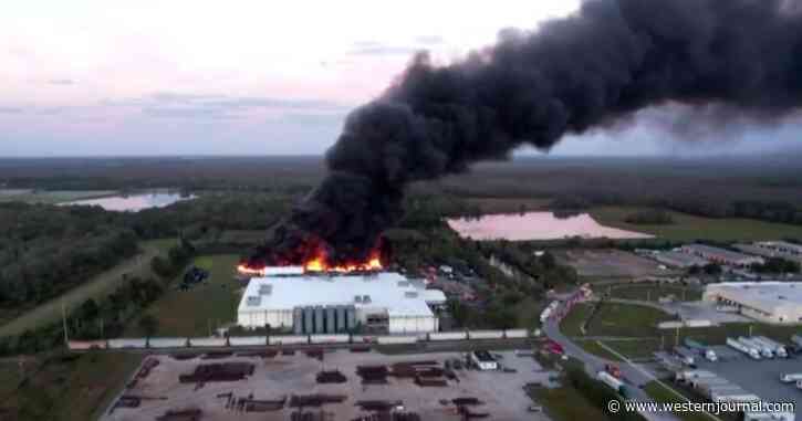 Hundreds of Pallets of Plastic Products Erupt Into Flames, Sending Thick Black Smoke Into Sky