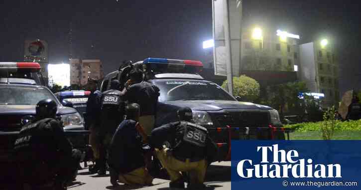 At least three killed as Pakistani Taliban militants storm police HQ in Karachi