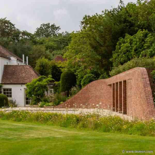 Knox Bhavan conceals brick pool house beneath grassy mound