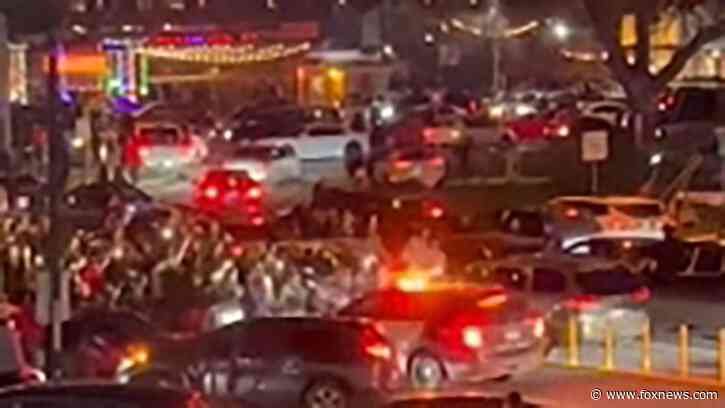 Austin police, 911 staffing levels questioned after street racers take over major intersection, injure cop