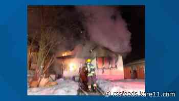 Firefighter transported to hospital, multiple dogs dead in Minneapolis house fire
