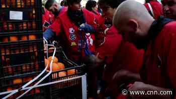 Watch thousands of oranges go flying through air in massive food fight