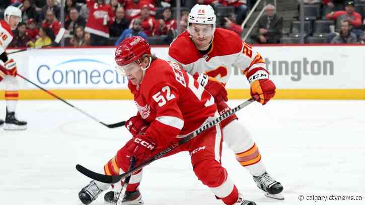 Calgary Flames place defenceman Michael Stone on IR, recall Walker Duehr from AHL