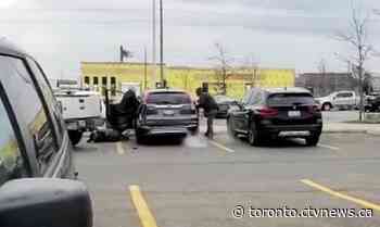 Violent carjacking in Milton, Ont. grocery parking lot captured on video