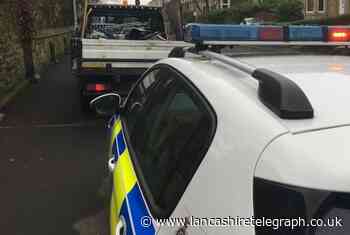 Burnley police carry out checks on waste disposal vehicles