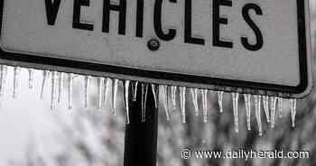 Ice storm leaves nearly 100,000 without power, closes schools