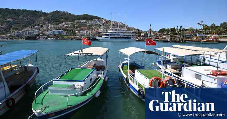 ‘I’m hanging between worlds’: couple who fled Russia toy with returning