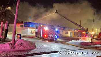 Fire crews battle fire at Erbert & Gerbert's, Bergquist Imports in Cloquet