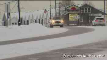 Outside of Minneapolis and St. Paul, road crews prepare for snowfall, wind and blowing snow