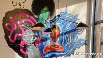 High school students paint mural in Beltline to celebrate Black History Month