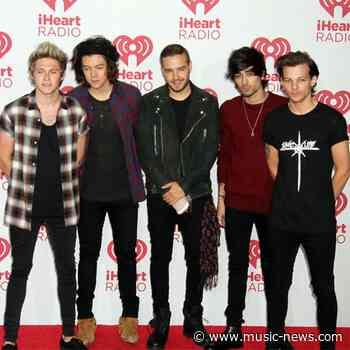 Louis Tomlinson admits a One Direction reunion is 'hard to imagine right now'