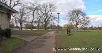 Moment motorbike whizzed through Hull park after nearly 'taking out' walker caught on camera