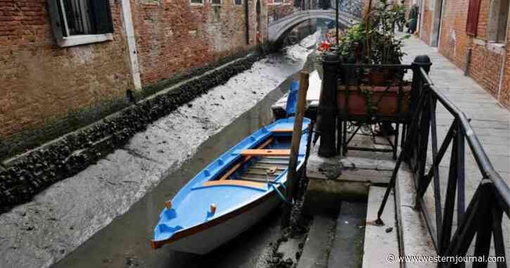 Shocking Sight as Venice's Famous Canals Run Dry