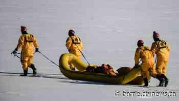 Two men rescued after plunging through ice on ATV