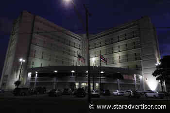 Former girls basketball coach accused of child porn remains in jail