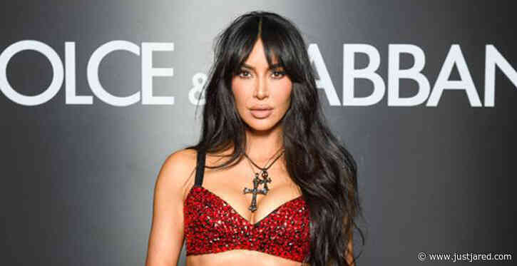 Kim Kardashian Sizzles in Red Bedazzled Crop Top & Matching Skirt for Dolce & Gabbana Show in Milan