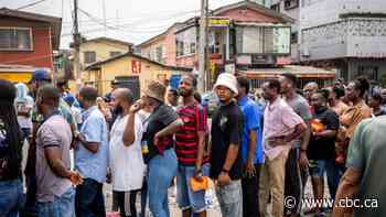Long waits for voters in Nigeria as country awaits news of new president