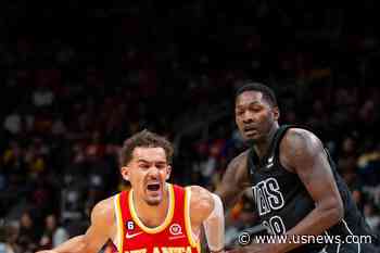 Young's Buzzer-Beating Jumper Lifts Hawks Past Nets 129-127
