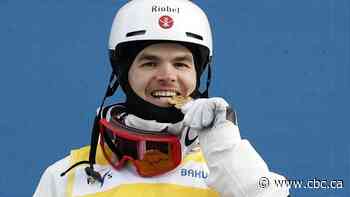 Kingsbury wins 3rd straight dual moguls world title, holding off reigning Olympic champ