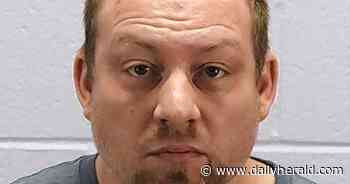 Aurora man held on child porn charges