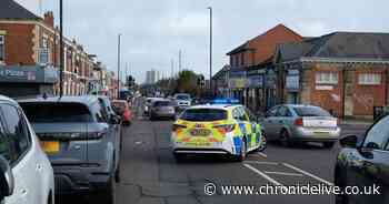 Man taken to hospital after motorbike crashes into parked car in Walker