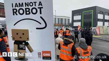 Amazon UK workers walk out on strike in pay row