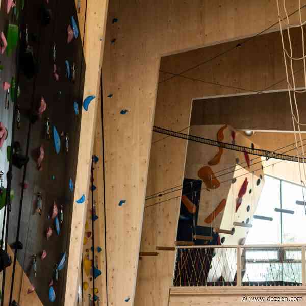 Snøhetta creates cavernous timber climbing centre in Norway