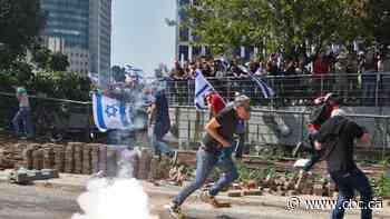 Israeli police arrest dozens, use stun grenades in protests against Netanyahu government