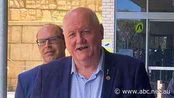 In his once-safe seat, Liberal MP enters the fray amid Labor lifers, hecklers and a portrait of the PM