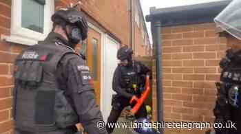 23-year-old arrested as police raid Blackburn house