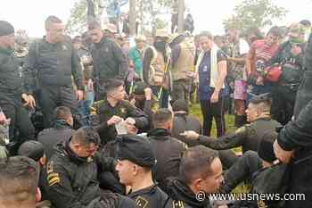 Two Dead, Dozens of Police Held Hostage in Colombia in Protest Against Oil Company
