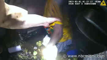 Video Shows Florida Deputies Saving Driver From Submerged Car After Phone SOS Signal