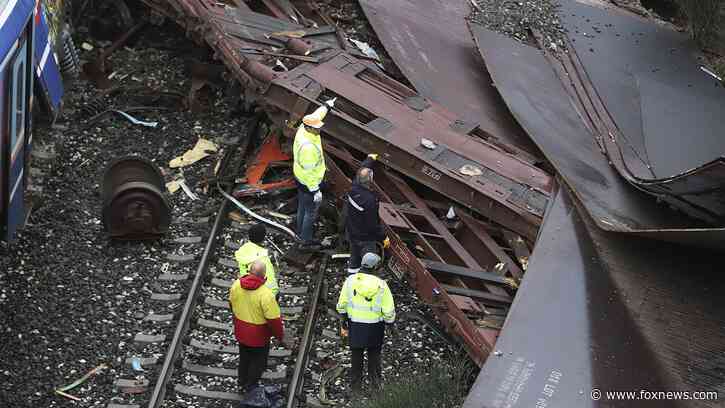 Greek transportation minister resigns, station manager arrested after head-on train crash kills 57